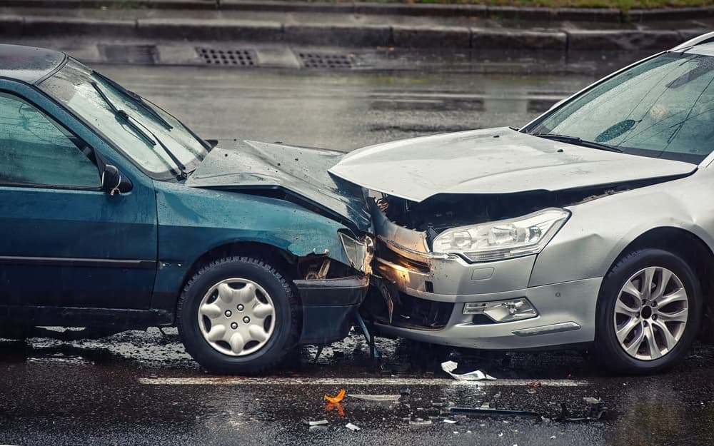 Two cars damaged after head-on collision